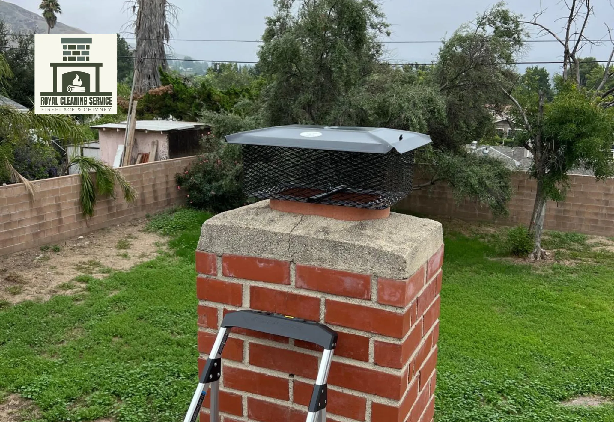 Royal Cleaning Service technician inspecting a Camarillo ranch home fireplace chimney